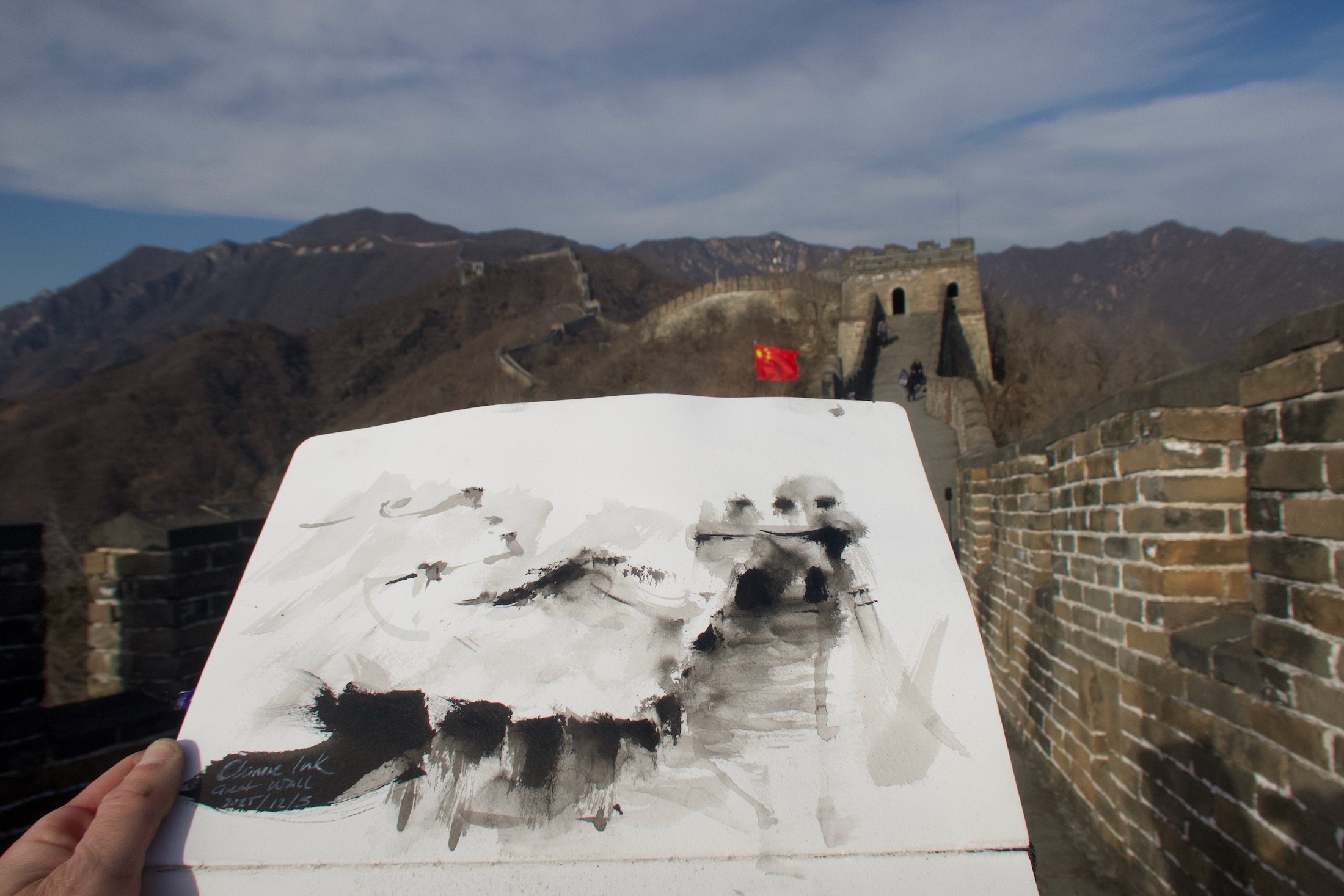 Chinese Ink Painting the Great Wall on location with traditional Chinese ink.